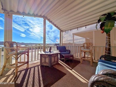 Up-close panoramic lake views right from your front patio inside on London Bridge Golf Course in Arizona - for sale on GolfHomes.com, golf home, golf lot