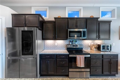 Welcome to this beautifully designed condo nestled along the on Shaker Run Golf Club  in Ohio - for sale on GolfHomes.com, golf home, golf lot
