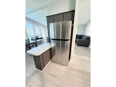 Welcome to this beautifully maintained two-bedroom, two-bath on Lake Fairways Country Club in Florida - for sale on GolfHomes.com, golf home, golf lot
