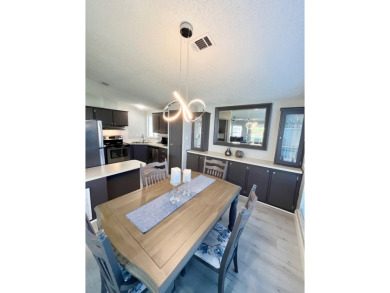 Welcome to this beautifully maintained two-bedroom, two-bath on Lake Fairways Country Club in Florida - for sale on GolfHomes.com, golf home, golf lot
