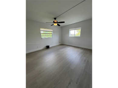 Rare Oversized Corner Unit in Century Village 55+ - 2 on Flamingo Lakes Country Club in Florida - for sale on GolfHomes.com, golf home, golf lot