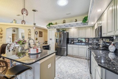 This Kent III Pool Home on Golf Course has all the Up-Grades and on Heritage Pines Country Club in Florida - for sale on GolfHomes.com, golf home, golf lot