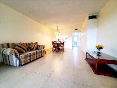 BEAUTIFUL MOVE IN READY, PARTIALLY FURNISHED 2/2 THIRD FLOOR on Sunrise Lakes Phase IV Golf Course in Florida - for sale on GolfHomes.com, golf home, golf lot
