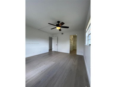 Rare Oversized Corner Unit in Century Village 55+ - 2 on Flamingo Lakes Country Club in Florida - for sale on GolfHomes.com, golf home, golf lot