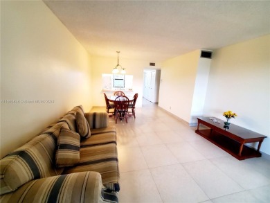 BEAUTIFUL MOVE IN READY, PARTIALLY FURNISHED 2/2 THIRD FLOOR on Sunrise Lakes Phase IV Golf Course in Florida - for sale on GolfHomes.com, golf home, golf lot