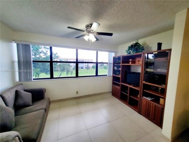 BEAUTIFUL MOVE IN READY, PARTIALLY FURNISHED 2/2 THIRD FLOOR on Sunrise Lakes Phase IV Golf Course in Florida - for sale on GolfHomes.com, golf home, golf lot