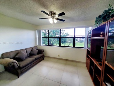 BEAUTIFUL MOVE IN READY, PARTIALLY FURNISHED 2/2 THIRD FLOOR on Sunrise Lakes Phase IV Golf Course in Florida - for sale on GolfHomes.com, golf home, golf lot