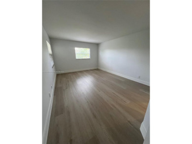 Rare Oversized Corner Unit in Century Village 55+ - 2 on Flamingo Lakes Country Club in Florida - for sale on GolfHomes.com, golf home, golf lot