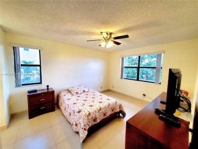 BEAUTIFUL MOVE IN READY, PARTIALLY FURNISHED 2/2 THIRD FLOOR on Sunrise Lakes Phase IV Golf Course in Florida - for sale on GolfHomes.com, golf home, golf lot