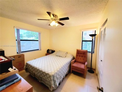 BEAUTIFUL MOVE IN READY, PARTIALLY FURNISHED 2/2 THIRD FLOOR on Sunrise Lakes Phase IV Golf Course in Florida - for sale on GolfHomes.com, golf home, golf lot