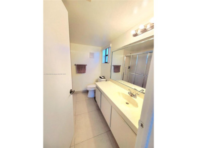 BEAUTIFUL MOVE IN READY, PARTIALLY FURNISHED 2/2 THIRD FLOOR on Sunrise Lakes Phase IV Golf Course in Florida - for sale on GolfHomes.com, golf home, golf lot