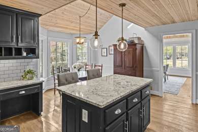 Must see this beautiful updated ranch home nestled in the on Reynolds Lake Oconee - The Landing in Georgia - for sale on GolfHomes.com, golf home, golf lot