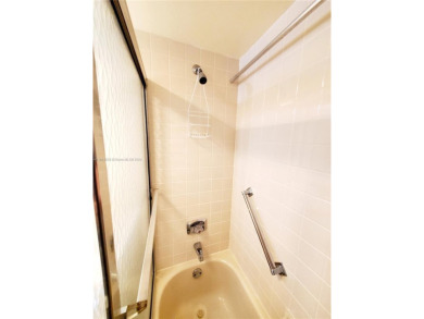 BEAUTIFUL MOVE IN READY, PARTIALLY FURNISHED 2/2 THIRD FLOOR on Sunrise Lakes Phase IV Golf Course in Florida - for sale on GolfHomes.com, golf home, golf lot