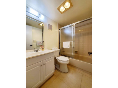 BEAUTIFUL MOVE IN READY, PARTIALLY FURNISHED 2/2 THIRD FLOOR on Sunrise Lakes Phase IV Golf Course in Florida - for sale on GolfHomes.com, golf home, golf lot