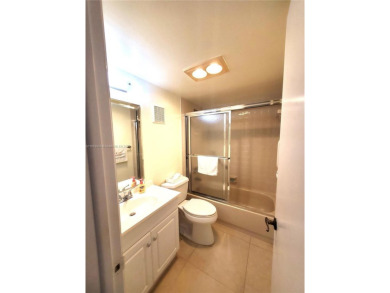 BEAUTIFUL MOVE IN READY, PARTIALLY FURNISHED 2/2 THIRD FLOOR on Sunrise Lakes Phase IV Golf Course in Florida - for sale on GolfHomes.com, golf home, golf lot