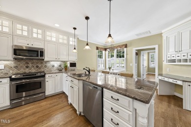 Explore this charming Charleston-style home in Sunset Ridge on Devils Ridge Golf Club in North Carolina - for sale on GolfHomes.com, golf home, golf lot