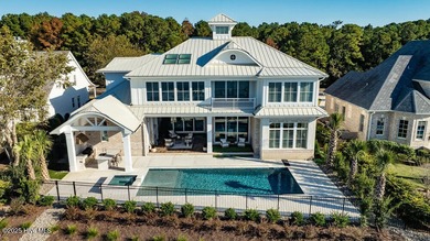 1737 S Moorings is a stunning coastal water front modern brick on Country Club of Landfall in North Carolina - for sale on GolfHomes.com, golf home, golf lot