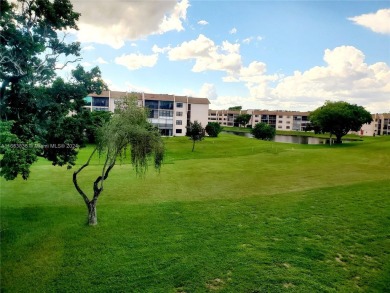 BEAUTIFUL MOVE IN READY, PARTIALLY FURNISHED 2/2 THIRD FLOOR on Sunrise Lakes Phase IV Golf Course in Florida - for sale on GolfHomes.com, golf home, golf lot