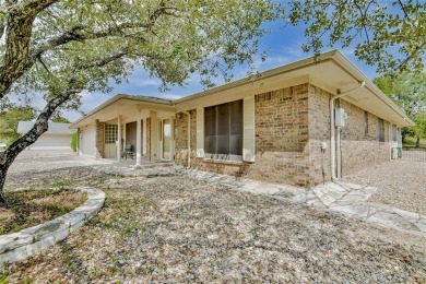 Nestled in a peaceful, enclave of Pecan Plantation, this on Pecan Plantation Country Club in Texas - for sale on GolfHomes.com, golf home, golf lot