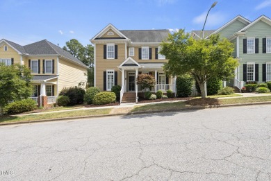 Explore this charming Charleston-style home in Sunset Ridge on Devils Ridge Golf Club in North Carolina - for sale on GolfHomes.com, golf home, golf lot