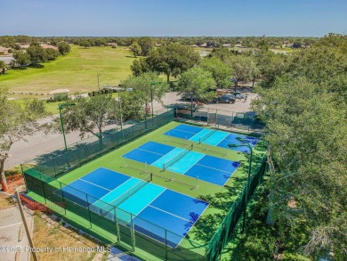 This Kent III Pool Home on Golf Course has all the Up-Grades and on Heritage Pines Country Club in Florida - for sale on GolfHomes.com, golf home, golf lot