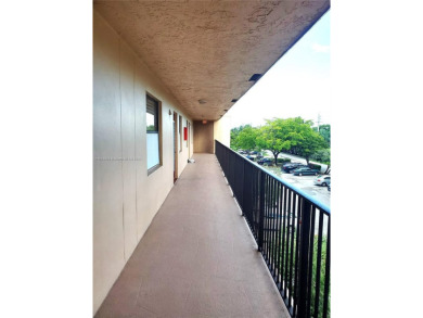 BEAUTIFUL MOVE IN READY, PARTIALLY FURNISHED 2/2 THIRD FLOOR on Sunrise Lakes Phase IV Golf Course in Florida - for sale on GolfHomes.com, golf home, golf lot