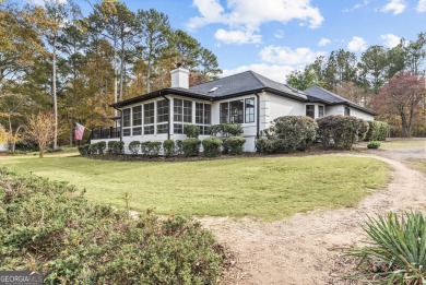 Must see this beautiful updated ranch home nestled in the on Reynolds Lake Oconee - The Landing in Georgia - for sale on GolfHomes.com, golf home, golf lot