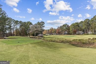 Must see this beautiful updated ranch home nestled in the on Reynolds Lake Oconee - The Landing in Georgia - for sale on GolfHomes.com, golf home, golf lot