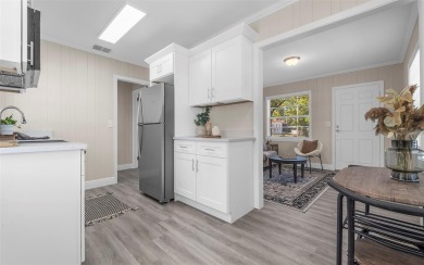Stunning! Gorgeous! Show Stopper! This beautifully updated on Babe Zaharias Golf Course in Florida - for sale on GolfHomes.com, golf home, golf lot