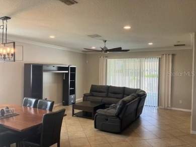 Welcome to this beautifully maintained home, 4 bedrooms 3 baths on Summerfield Crossing Golf Club in Florida - for sale on GolfHomes.com, golf home, golf lot