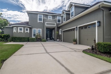 Welcome to your dream home, located on the 9th hole in the on The Club at Eaglebrooke in Florida - for sale on GolfHomes.com, golf home, golf lot