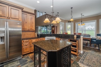 Welcome to your dream home, located on the 9th hole in the on The Club at Eaglebrooke in Florida - for sale on GolfHomes.com, golf home, golf lot