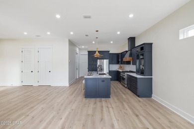 Discover luxury living and unmatched flexibility in this on Bay Point Resort Golf Club in Florida - for sale on GolfHomes.com, golf home, golf lot