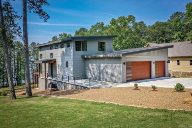 Situated on the shores Greers Ferry Lake, this home showcases for sale on GolfHomes.com