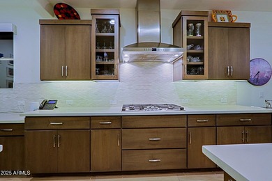 This home is a must see-Located in Trilogy at Verde River Golf & on Vista Verde Golf Course in Arizona - for sale on GolfHomes.com, golf home, golf lot