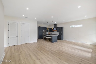 Discover luxury living and unmatched flexibility in this on Bay Point Resort Golf Club in Florida - for sale on GolfHomes.com, golf home, golf lot