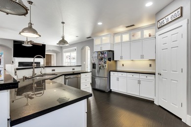 Beautiful home in an exclusive gated community near Odessa on Odessa Country Club in Texas - for sale on GolfHomes.com, golf home, golf lot