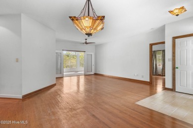 Welcome home to this cozy custom-built ranch nestled in the on Sound Golf Links at Albemarle Plantation in North Carolina - for sale on GolfHomes.com, golf home, golf lot