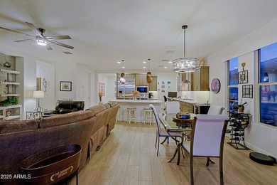 This home is a must see-Located in Trilogy at Verde River Golf & on Vista Verde Golf Course in Arizona - for sale on GolfHomes.com, golf home, golf lot