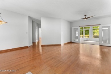 Welcome home to this cozy custom-built ranch nestled in the on Sound Golf Links at Albemarle Plantation in North Carolina - for sale on GolfHomes.com, golf home, golf lot