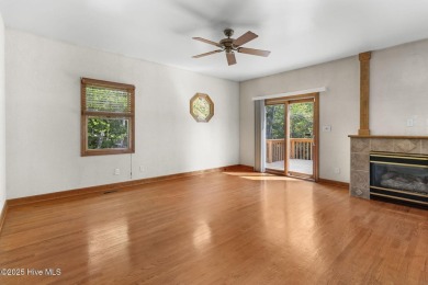 Welcome home to this cozy custom-built ranch nestled in the on Sound Golf Links at Albemarle Plantation in North Carolina - for sale on GolfHomes.com, golf home, golf lot
