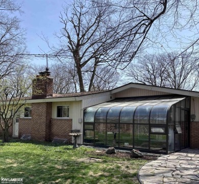 Welcome to this well maintained ranch with 3 bedrooms and 2 on Cherry Creek Golf Club in Michigan - for sale on GolfHomes.com, golf home, golf lot
