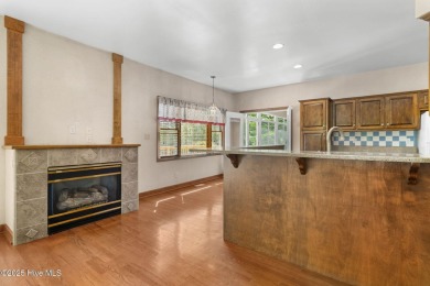 Welcome home to this cozy custom-built ranch nestled in the on Sound Golf Links at Albemarle Plantation in North Carolina - for sale on GolfHomes.com, golf home, golf lot