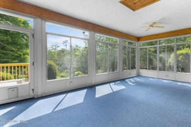 Welcome home to this cozy custom-built ranch nestled in the on Sound Golf Links at Albemarle Plantation in North Carolina - for sale on GolfHomes.com, golf home, golf lot