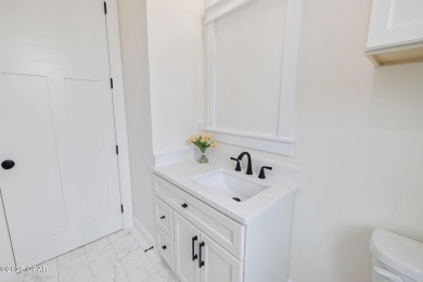 Discover luxury living and unmatched flexibility in this on Bay Point Resort Golf Club in Florida - for sale on GolfHomes.com, golf home, golf lot