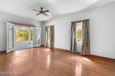 Welcome home to this cozy custom-built ranch nestled in the on Sound Golf Links at Albemarle Plantation in North Carolina - for sale on GolfHomes.com, golf home, golf lot
