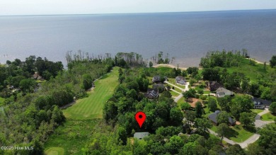 Welcome home to this cozy custom-built ranch nestled in the on Sound Golf Links at Albemarle Plantation in North Carolina - for sale on GolfHomes.com, golf home, golf lot