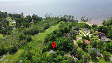 Welcome home to this cozy custom-built ranch nestled in the on Sound Golf Links at Albemarle Plantation in North Carolina - for sale on GolfHomes.com, golf home, golf lot