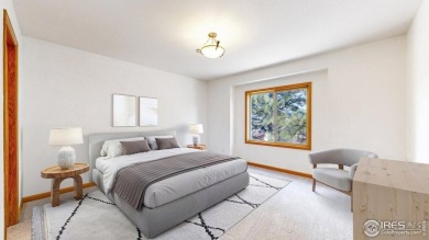 Tucked in the sought-after Mountain Golf Villas community, this on Estes Park Golf Course in Colorado - for sale on GolfHomes.com, golf home, golf lot