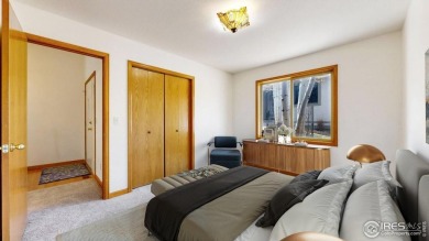 Tucked in the sought-after Mountain Golf Villas community, this on Estes Park Golf Course in Colorado - for sale on GolfHomes.com, golf home, golf lot